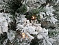 Искусственная елка Атлантида заснеженная с гирляндой 312 ламп
